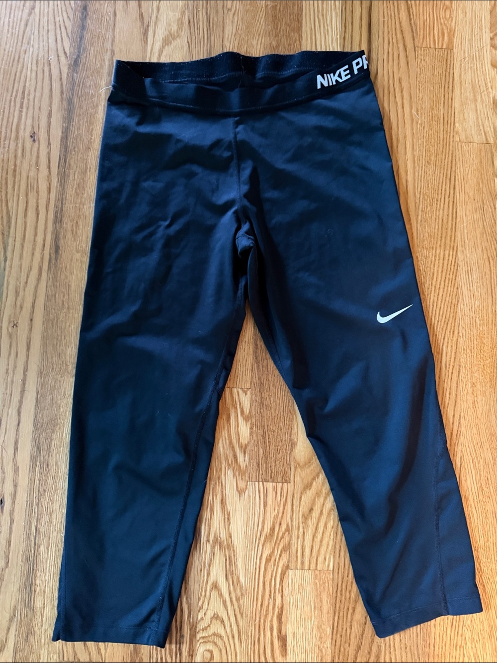 Nike women’s  Black Crop Leggings with White Swoosh